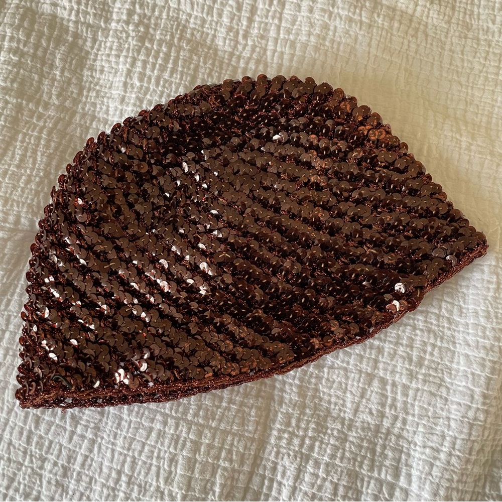 Rare 70s vintage Halston sequin knit skull cap with metallic lurex fibers.